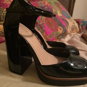 Black close toe strap heels